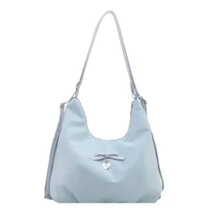 Light blue large capacity multi-functional backpack and shoulder bag with heart charm
