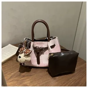 Vintage pink plaid bucket bag set featuring brown pouch and cute plush puppy charm