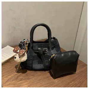 Vintage checkered bucket bag set with matching black pouch and cute teddy bear charm
