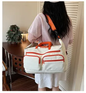 Large capacity travel duffel bag with adjustable shoulder strap for short trips and fitness.