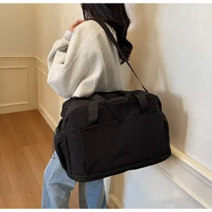 Large capacity travel duffel bag for short business trips, sports, fitness, and weekend getaways.