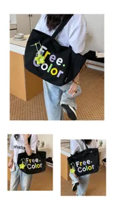 Casual canvas tote bag for women, stylish letter embroidery shoulder bag with floral pendant.