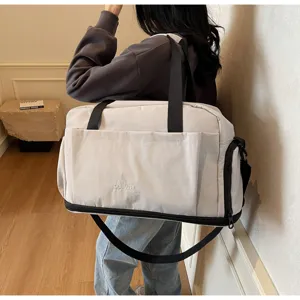 Large capacity travel duffel bag with expandable bottom for short trips and daily fitness workouts.