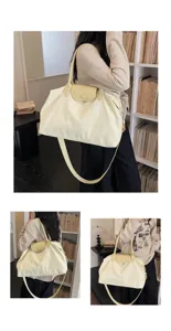 Large capacity yellow travel shoulder bag with cute bow embroidery and leather flap snap closure.