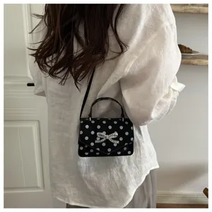 Élégant sac à bandoulière noir à pois avec un nœud en strass scintillant pour femme