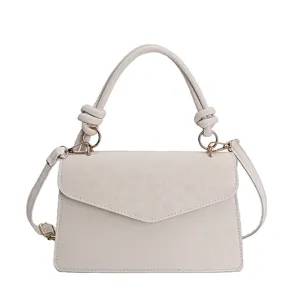 Sac à main élégant blanc cassé à imprimé léopard avec une poignée nouée tendance
