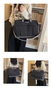Detailansicht der Reisetasche mit strapazierfähigem Stoff, stabilen Griffen und viel Stauraum.