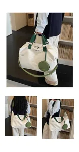 Large capacity travel duffel bag with green straps and small round pouch for short trips.