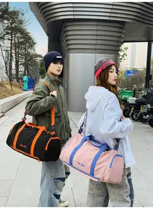 Detailed street scene showing large capacity travel duffel gym bag with dry wet separation.