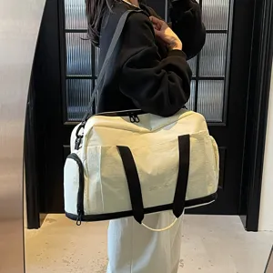 Large capacity travel duffel bag, casual shoulder bag for fitness, short trips and sports storage.