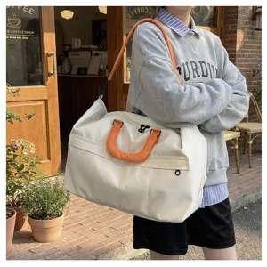 Large capacity travel duffel bag, lightweight waterproof canvas weekender bag for women and men.