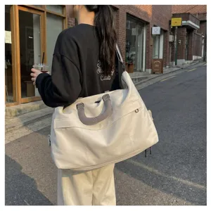 Large capacity white travel duffel bag for women and men, lightweight weekend overnight bag.