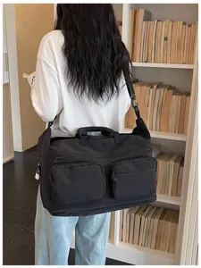 Large capacity travel duffel bag with multi-pockets, ideal for short trips, gym and storage use.