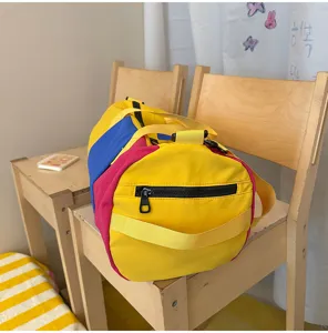 Colorful color block travel duffel bag for women, large capacity lightweight gym fitness bag.