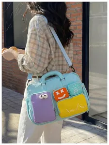 Bolsa de viaje colorblock informal con múltiples bolsillos, gran capacidad para estudiantes.