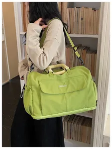Large capacity green travel duffel bag with shoulder strap, portable lightweight gym fitness bag.