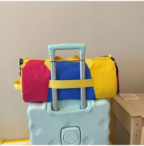 Colorblocked travel duffel bag large capacity fitness gym bag with secure luggage strap