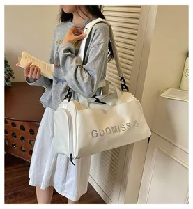 Large capacity white fitness gym bag with shoulder strap for travel and sports training.