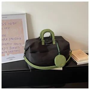 Borsa da viaggio minimalista di grande capacità con manici verdi e borsetta rotonda per sport.