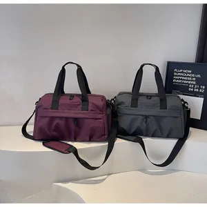 Large capacity travel duffel bag waterproof gym bag with shoe compartment and shoulder strap.