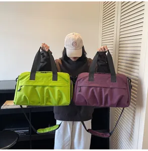 Large capacity travel duffel bag with shoe compartment, lightweight fitness gym bag details.