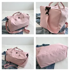 Pink travel duffel bag with large capacity, dry-wet separation and shoe compartment for fitness.