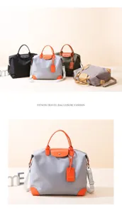 Stylish nylon travel duffel bag for men and women, large capacity fitness shoulder luggage bag.