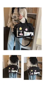 Black and white canvas travel duffel bag large capacity fitness gym bag with cute plush star deco.