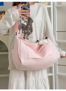 Detailed view of large capacity pink travel shoulder bag, lightweight gym bag with front pocket.
