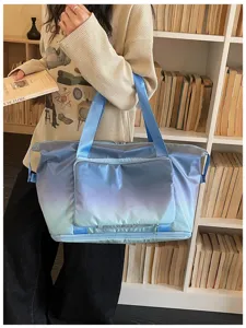Sac de voyage dégradé bleu grande capacité, sac de sport élégant pour voyage et entraînement.