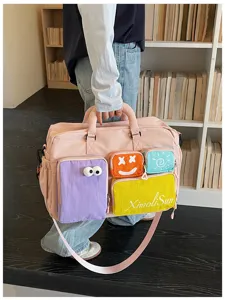 Gran bolsa de viaje rosa para mujer, bolso de fin de semana colorido de gran capacidad.