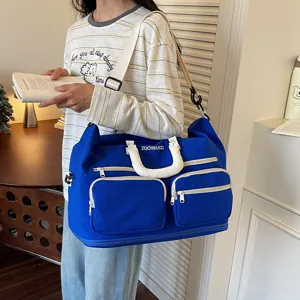 Large capacity travel duffel bag short trip luggage bag lightweight sports fitness bag utility storage.
