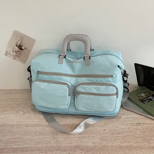 Large capacity travel duffel bag with multiple pockets, lightweight and expandable for gym and business.
