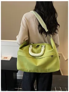 Large capacity travel duffel bag for women, lightweight gym and weekend overnight bag.