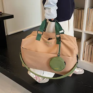 Large capacity travel duffel bag for short trips, lightweight portable fitness storage bag.