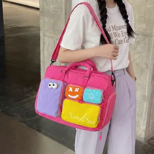Gran bolsa de viaje rosa con bolsillos coloridos y correa para mujeres y estudiantes.