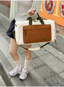 Large capacity travel duffel bag with dry-wet separation, cream and brown canvas design.