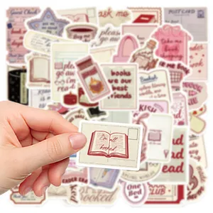 Detail view of vintage bookish aesthetic stickers featuring literary quotes and retro designs.