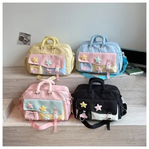 Large capacity multi-pocket travel duffel bag with cute star decorations for fitness and gym use.