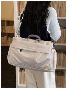 Large capacity travel duffel bag for women, waterproof gym bag for short trips and flights.
