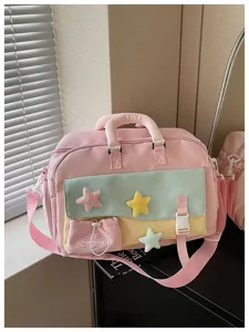 Pink pastel yoga travel duffel bag with cute plush star patches and spacious compartment.