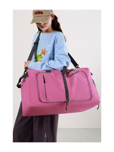 Foldable travel duffel bag with separate shoe compartment for sports and business trips.