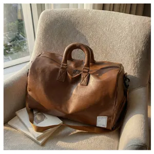 Braune Reisetasche aus weichem Leder, Freizeittasche für Pendler mit stabilen Griffen.
