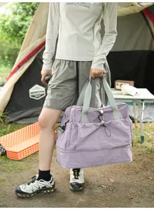 Large capacity travel duffel bag with separate compartment for camping and short trips.