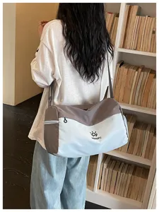 Large capacity travel duffel bag in grey and light blue, perfect for short trips and sports.