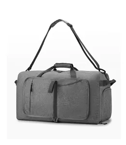 Detail view of the gray travel duffel bag with shoulder strap, zipper pockets and storage.