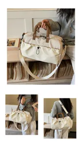 Bolsa de viaje casual grande con asas marrones y bolsillo con cordón para gimnasio.