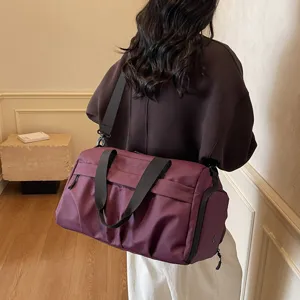 Large capacity travel duffel bag with shoe compartment, lightweight gym bag for portable travel.