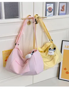 Casual large capacity canvas crossbody shoulder bag for women daily travel, light and stylish.