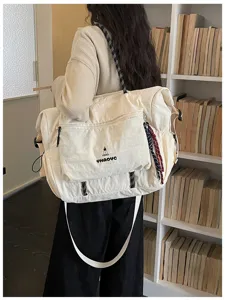 Japanese style large capacity canvas travel bag for short trips and gym fitness sports use.